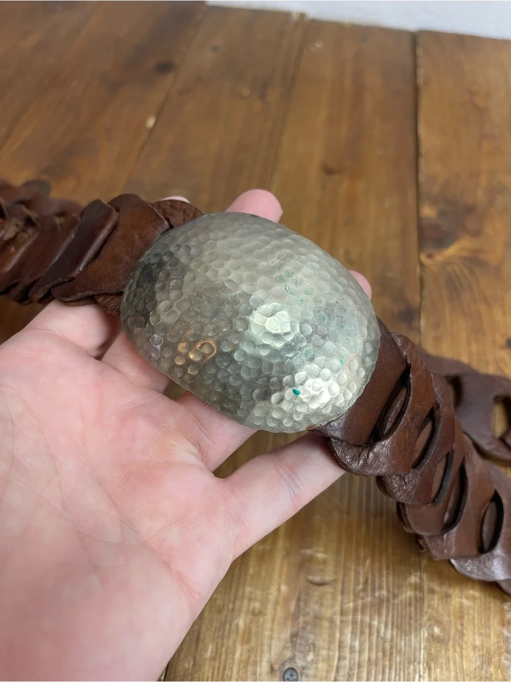 Linked leather belt with silvertone hammered buckle